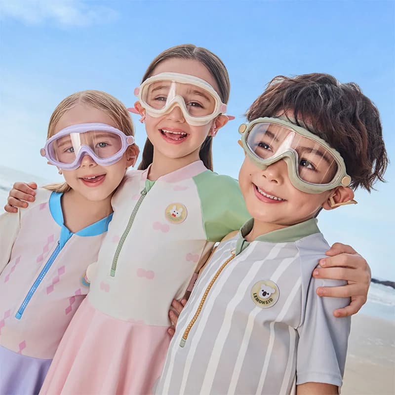 Lunettes de natation enfants anti-buée anti-UV - Vision large avec bouchons d'oreilles pour bébé nageur