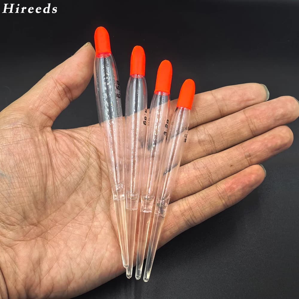 5 flotteurs de pêche à la mouche transparents à accents orange pour truite et saumon |