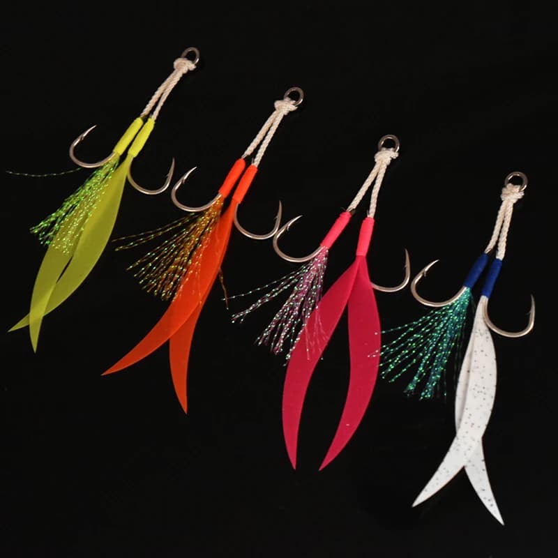 Set de 4 jigs métalliques avec jupe silicone et hameçons assist double acier carbone pour pêche en mer