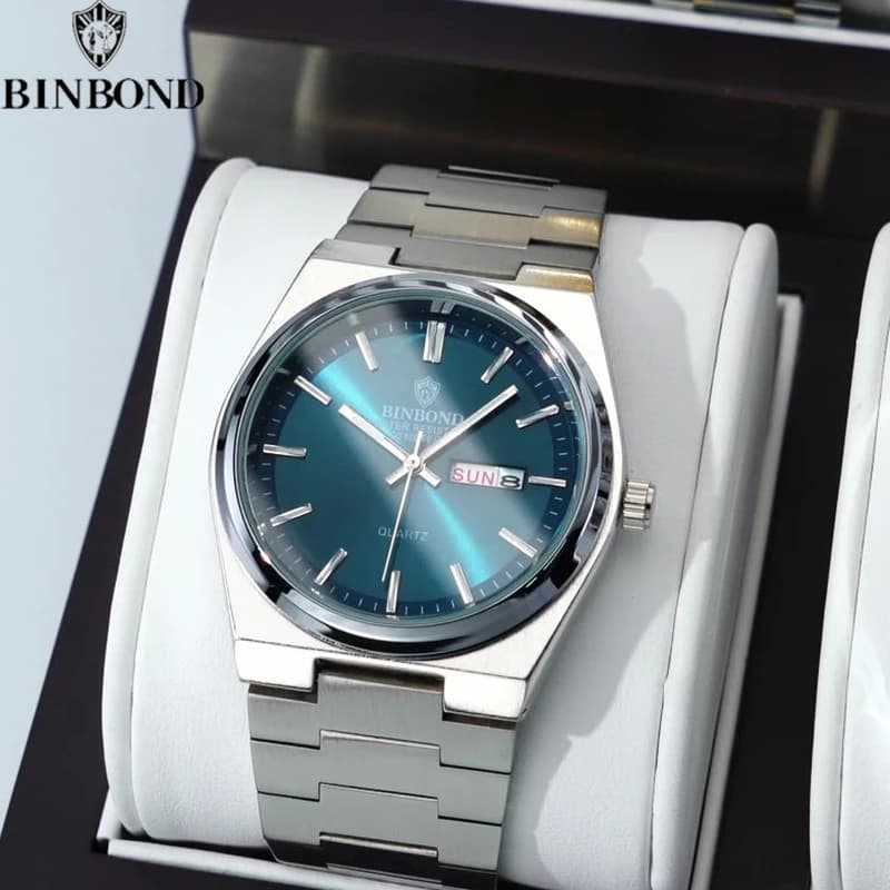 Montre homme d'affaires quartz acier inoxydable étanche calendrier luminescent cadeau élégant