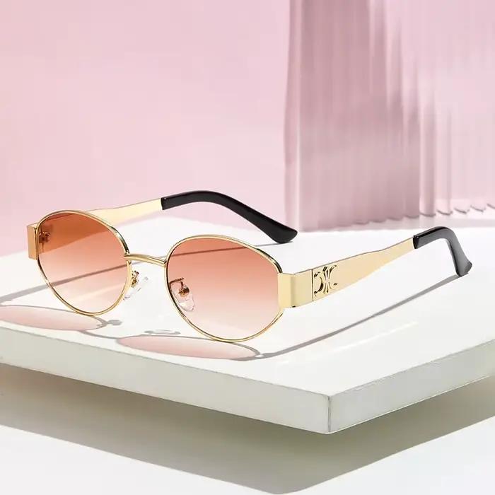Lunettes de soleil luxe unisexe pour pêcheurs élégants - Monture métal ovale dorée, style rétro glamour